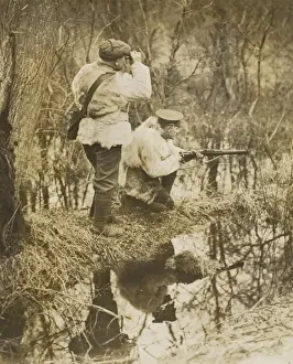 Binoculars Prints: WW1 - British soldiers in a wood wearing sheepskin jackets