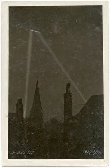 Nightime Gallery: WW1 - German Zeppelin picked by Searchlights over Woodford
