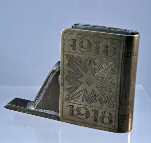 Images Dated 25th January 2012: WW1 novelty lighter in the shape of a book