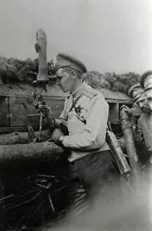 Periscope Collection: WW1 - Russian Front - Officer using a trench periscope