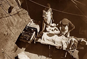 Surgeon Collection: WW1 Surgeon at work in a field hospital
