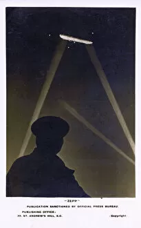 Zeppelin Gallery: WW1 - Zeppelin over the UK illuminated by searchlights
