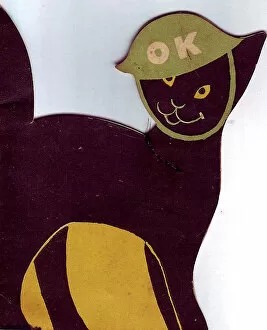 Correspondence Collection: WW2 greetings card, black cat in helmet