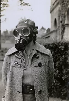 Images Dated 13th August 2018: WW2 - Home Front - Woman in her Gas Mask