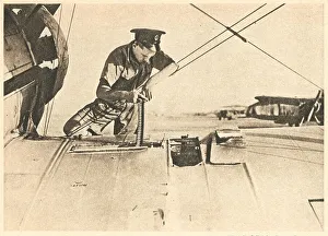WW2 - R. A. F. Fitting An Ammunition Belt