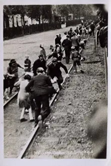 WW2, Rotterdam, The Netherlands - Scramble to get cigarettes
