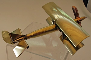 Images Dated 31st July 2011: WWI biplane bullet fuselage with copper propeller