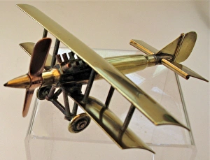 Images Dated 31st July 2011: WWI biplane bullet fuselage with copper propeller