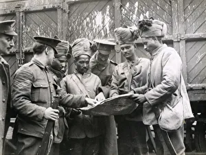 WWI: Indian colonial soldiers examine a map