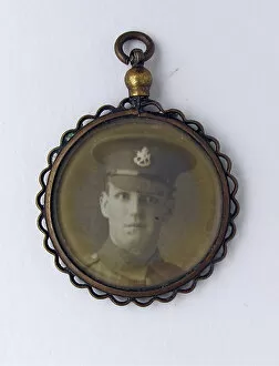 Images Dated 24th November 2012: WWI mourning fob with two photographs