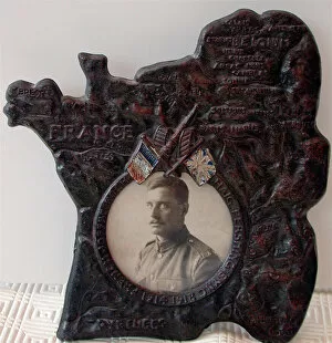 Towns Collection: WWI photo frame showing the Western Front with map