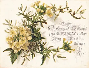 Yellow flowers made of silk on a birthday card