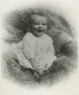 Images Dated 30th April 2020: A young baby on a fur-covered seat