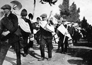 Young Belgians marching to dig shelter-trenches for the sold