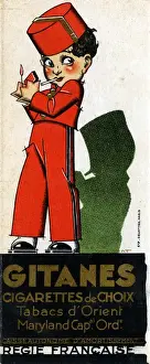 A young bellboy lights up his Gitanes Cigarette