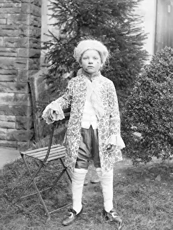 Buckles Prints: Young boy in Georgian costume in a garden, Mid Wales
