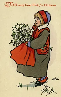 Young boy with mistletoe
