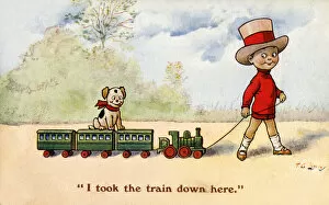 Images Dated 10th April 2019: Young boy pulls along his toy train - puppy takes a ride too