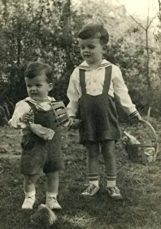 Dungarees Prints: Two young boys on an Easter egg hunt