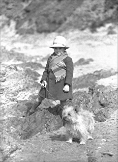 Young child and pet dog