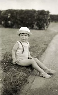 Young child in sunhat and sandals - Margate, Kent