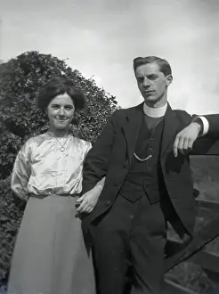 Curate Prints: Young clergyman with young woman