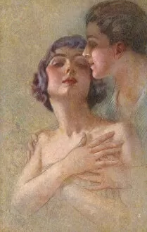 A young couple share a tender embrace