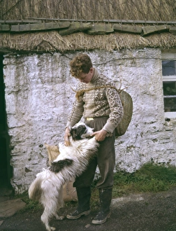 Wickerwork Gallery: Young crofter with his dog, Shetland, Scotland