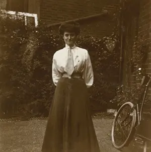 Young Edwardian woman in a garden