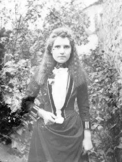 Young Edwardian woman in a garden, Mid Wales