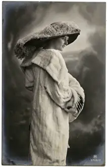 Mink Prints: Young Edwardian woman in large hat and mink coat