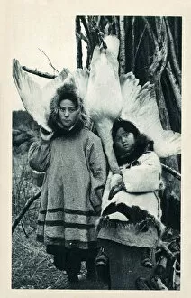 Alaska Collection: Two young Eskimo (Inuit) children with a captured goose