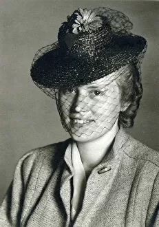 Smiles Gallery: Young German Woman wearing a small black hat with a veil. Date: circa 1930s