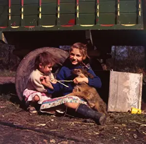 Wellies Prints: Two young gipsy girls with a dog, Charlwood, Surrey