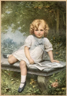Images Dated 17th June 2021: A young girl with blonde curls sits with her picture book on a stone bench in a woodland