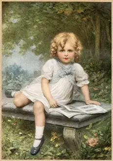 Curls Prints: A young girl with blonde curls sits with her picture book on a stone bench in a woodland