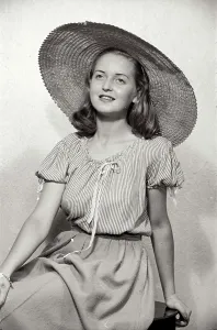 Multiple Prints: Young girl in hat portrait at Coronet photo studio, Haymarket, Sheffield Date: 1948 - 1950