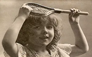 Lifestyle Prints: Young girl holding very little tennis racquet Date: 1905