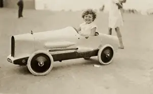 Automobilia Prints: Young girl in model racing car
