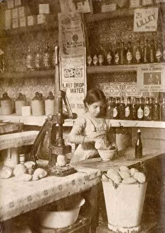 Dec18 Collection: Young girl preparing chips - Fish & Chip Shop, Morecambe