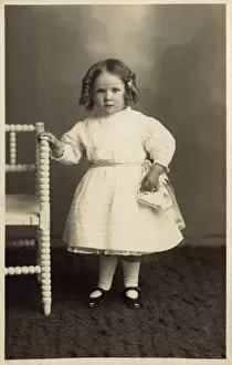 Young girl in pretty white dress
