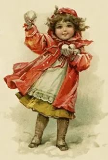Young girl with snowballs