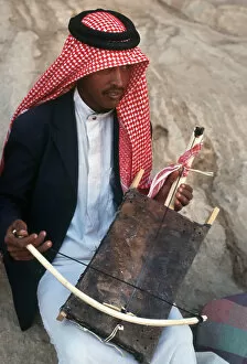 Jordan Gallery: A young Jordanian man plays a rababah