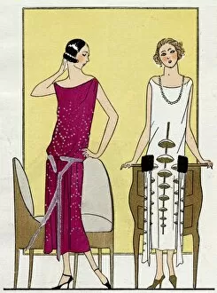 Two young ladies in dresses by Jeanne Lanvin