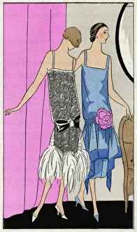 Two young ladies in dresses by Molyneux