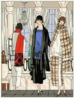 Three young ladies in outfits by Drecoll