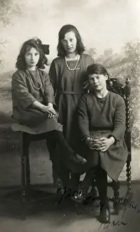 Relatives Prints: Three young ladies pose for a formal studio portrait
