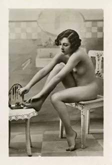 Tools Collection: Young Lady doing a pedicure on herself