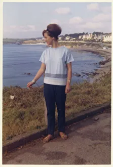 Images Dated 4th February 2021: Young lady on holiday - British coastline