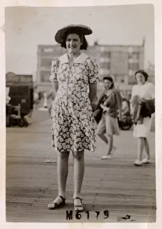 Young lady at the seaside - breezy day - floral print dress